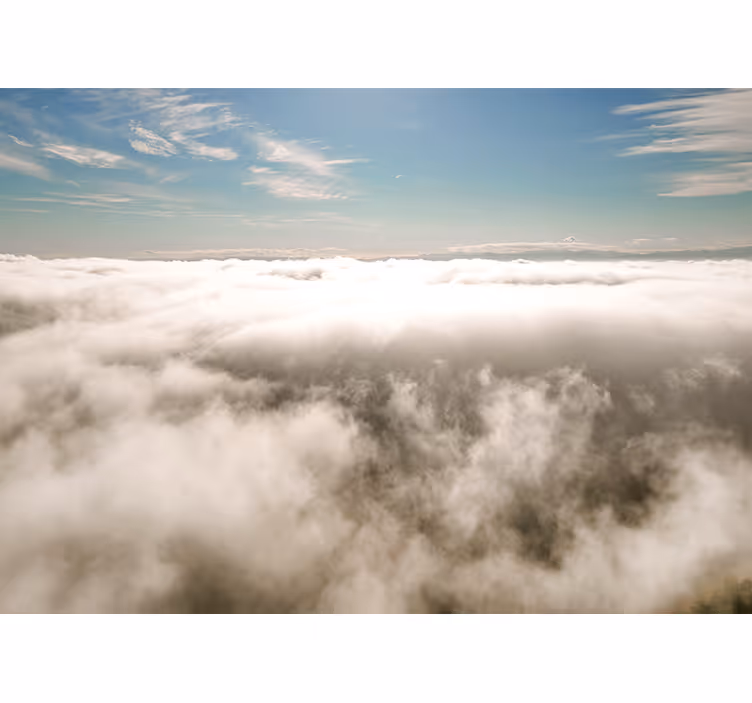 Fototapete Wohnzimmer Vom sonnenlicht beleuchtete wolken - TenStickers