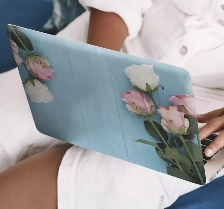 Laptop Aufkleber Blumenfarbe auf Hintergrund - TenStickers