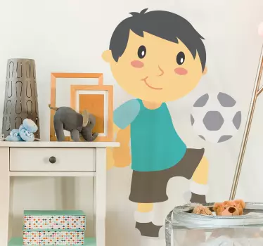 Wandtattoo Fußball spielender Junge - TenStickers